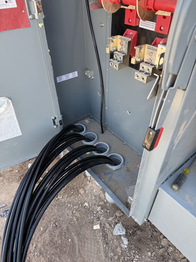 Feeder conductors neatly dressed into new electrical service equipment