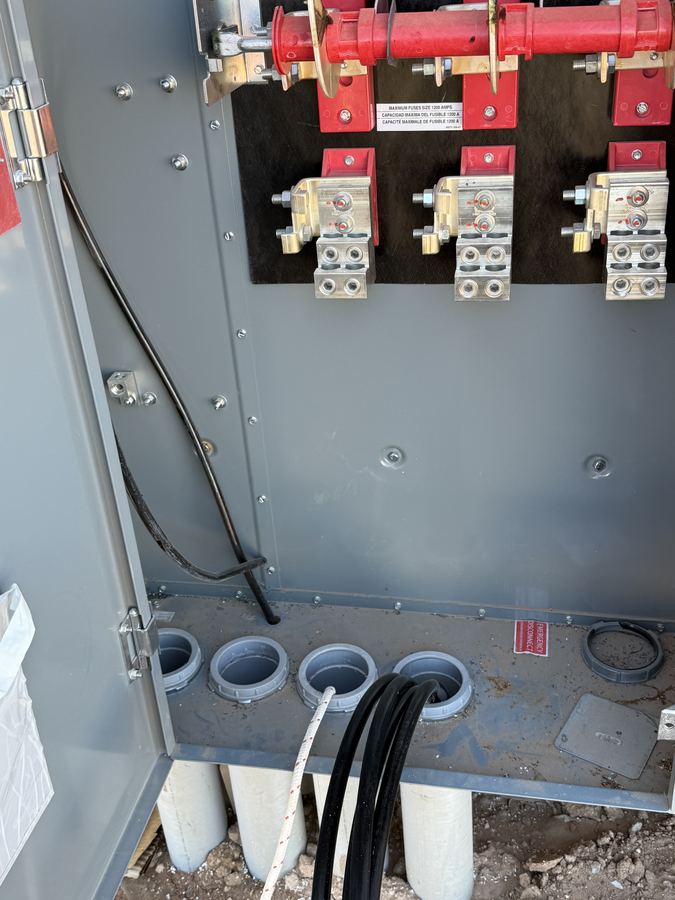 Electrical panel interior with breakers installed and circuits labeled
